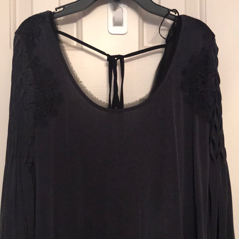 Free people dress with decorative sleeves and lace